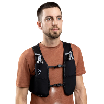 Man wearing a black hydration vest on a white background #color_black