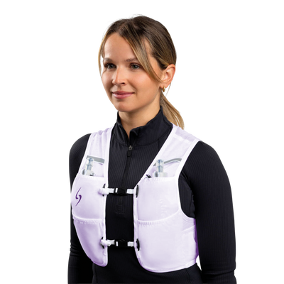 Woman wearing a white protective vest on a white background